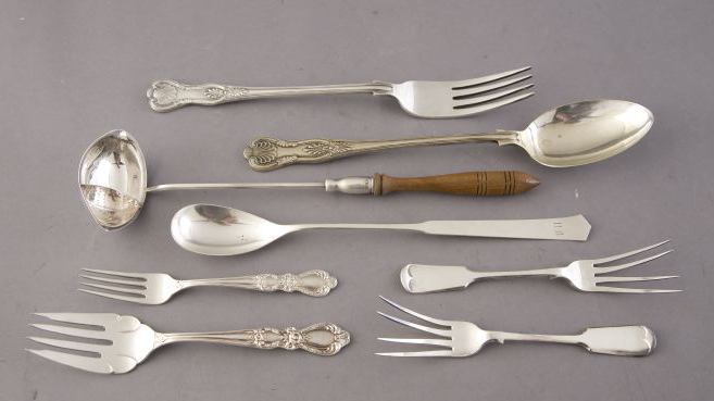 Eight Pieces of Sterling and Silverplate