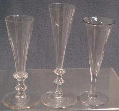 3 early handblown champagne flutes,
