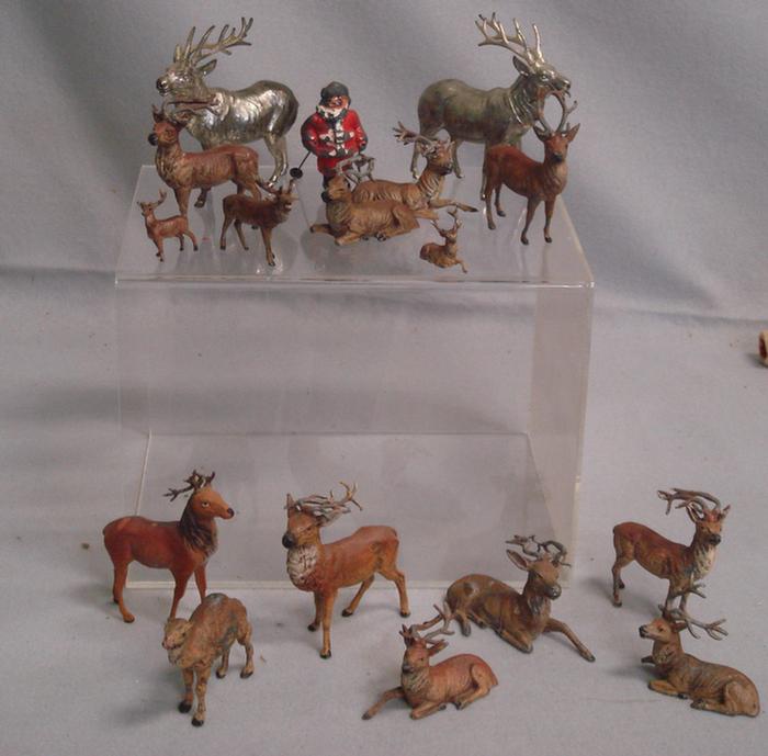 15 cast metal reindeer, one camel, one