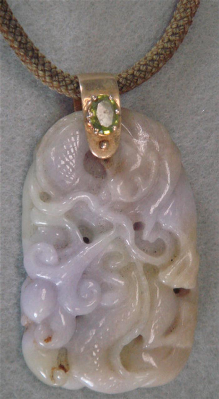 Carved Jade pendant, depicting