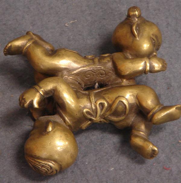 Brass 2 or 4 child illusionary figurine,