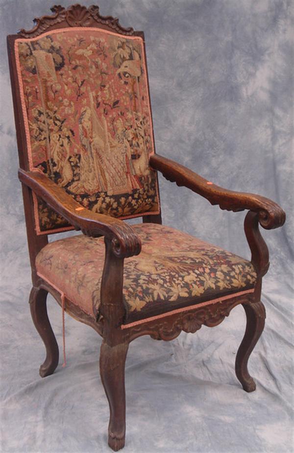 Carved oak French high back armchair,