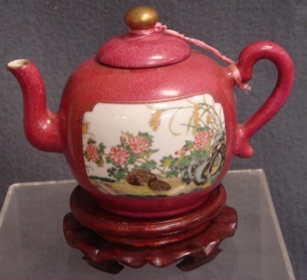 Chinese porcelain teapot, plum field