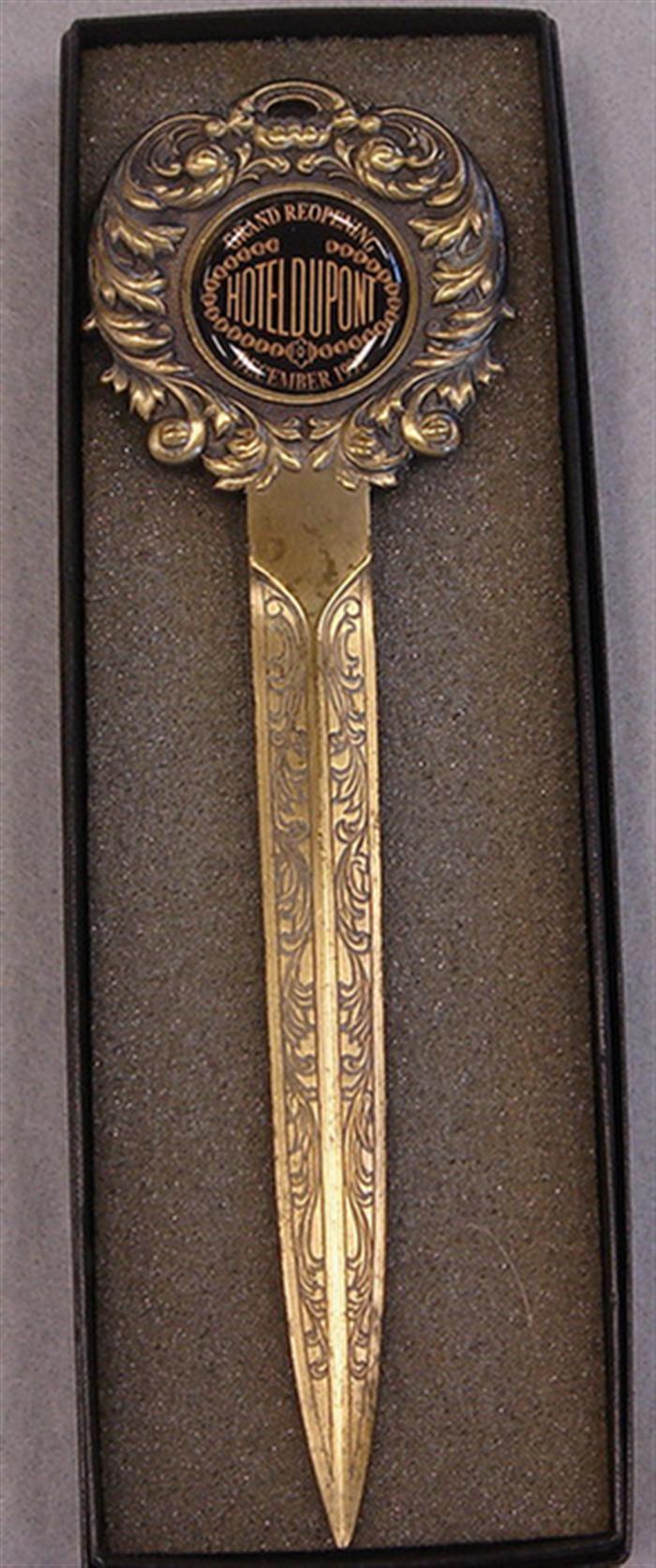 Vintage brass letter opener.  Medallion