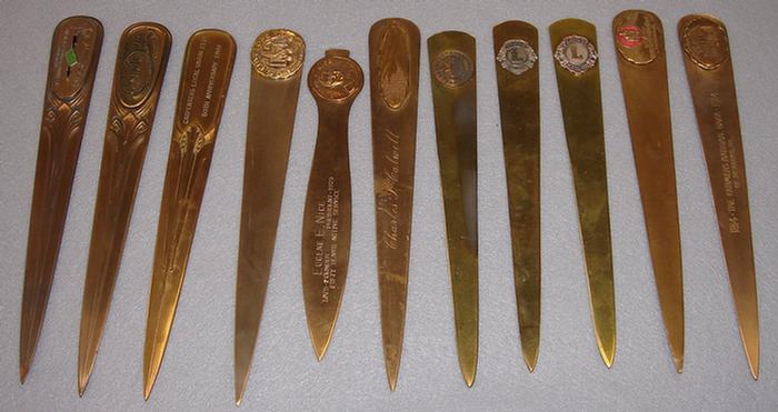 Lot of 11 vintage brass advertising 3ba3a