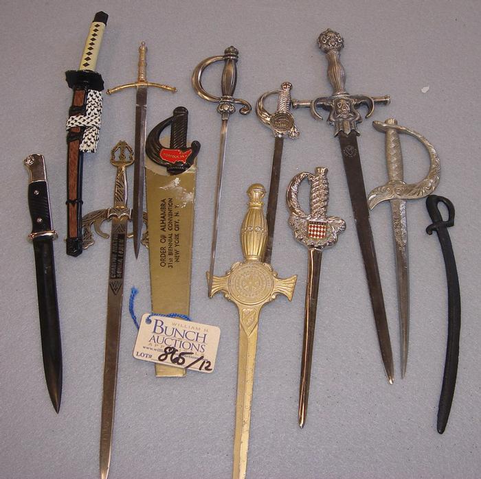 Lot of 12 vintage sword shaped 3ba4d