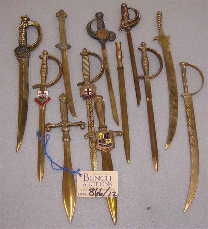 Lot of 12 vintage brass sword shaped 3ba4e
