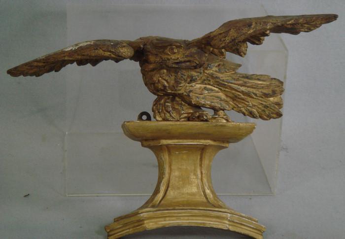Carved and gilt wood eagle on a 3beb5