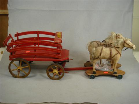 Horse drawn wooden delivery wagon, felt