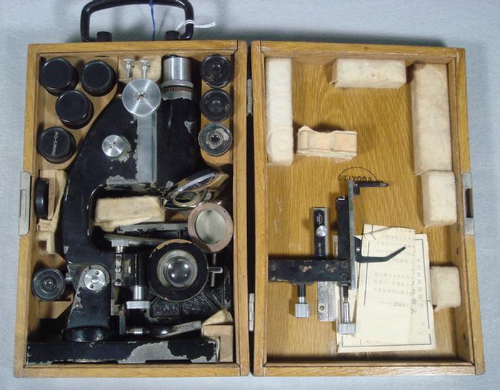 Cased Tiyoda microscope, fully fitted