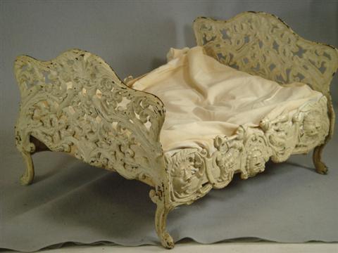 Cast iron doll bed, floral and bird