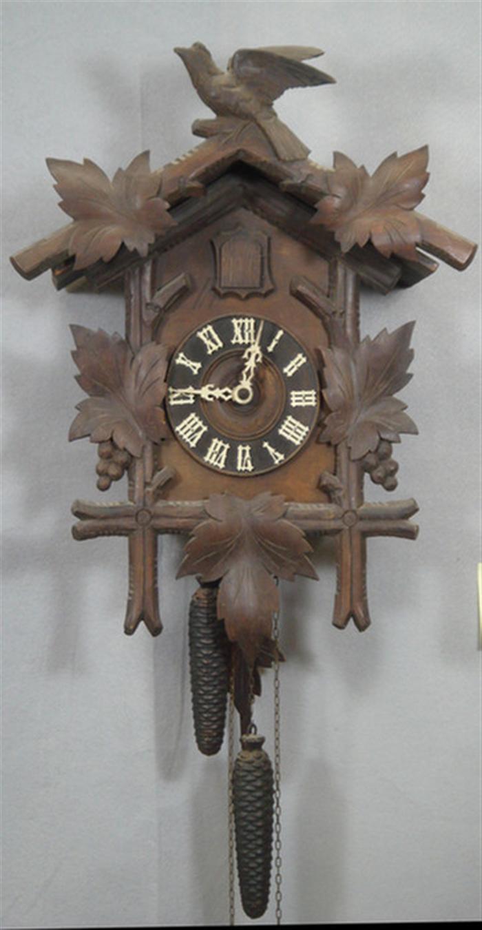 Carved Black Forest cuckoo clock, bird