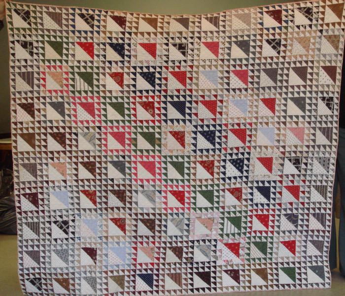 Patchwork quilt, log cabin pattern,