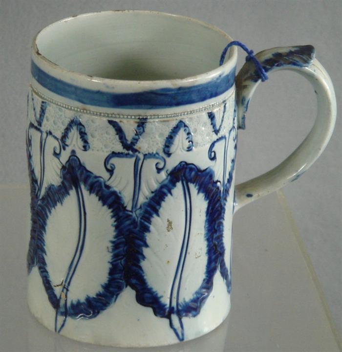 Blue decorated Leeds mug with featheredge