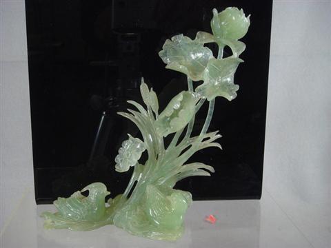 Green jade floral & bird group, 19th/20th