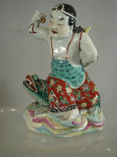 Chinese porcelain figure of a child