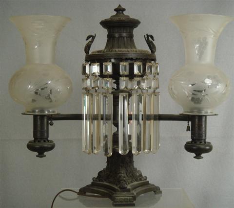 Double arm Argand lamp with label