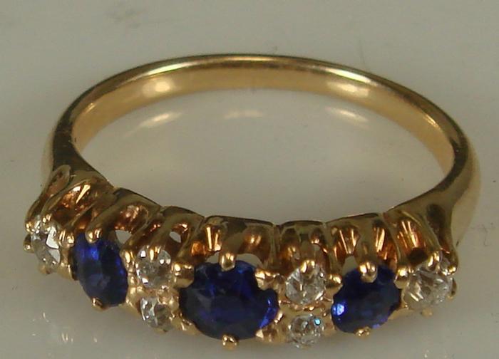 14K yg Diamond and Sapphire Ring.