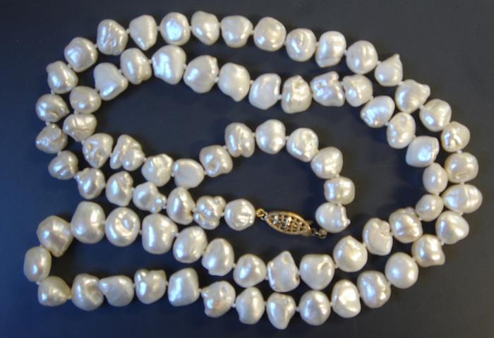 14K yg Strand of Baroque Pearls.