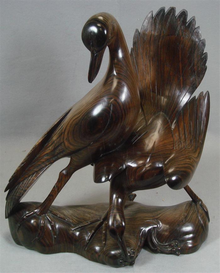 Carved teak double bird figurine,