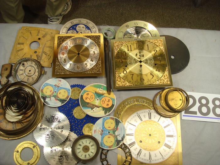 Group of brass clock dials, moon dials,