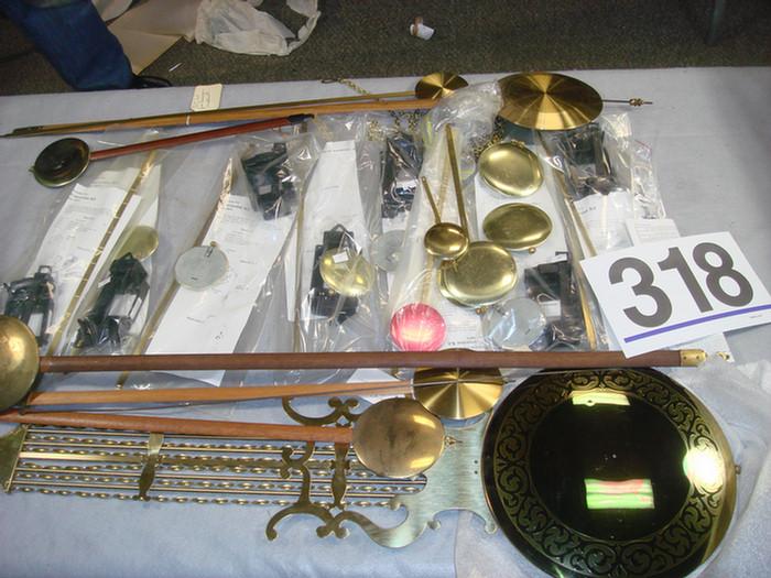 Lot of assorted pendulums and pendulum