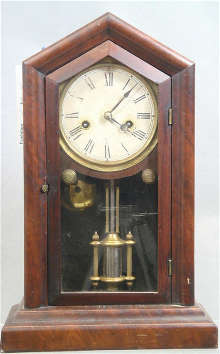 Mahogany Ingraham cottage clock, worn