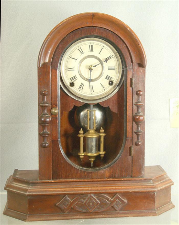 Walnut Gilbert mantle clock, oval