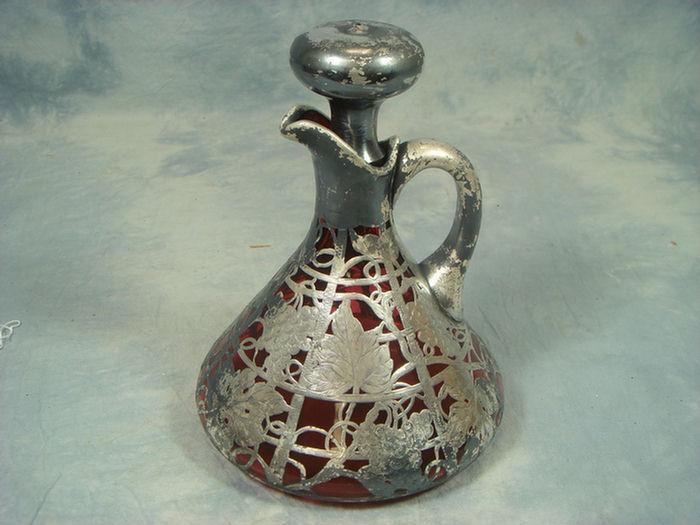Silver overlay cranberry glass decanter,