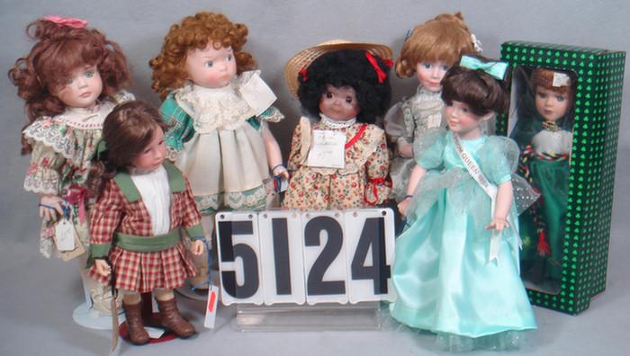 Porcelain Dolls, 11 to 14 inches tall.