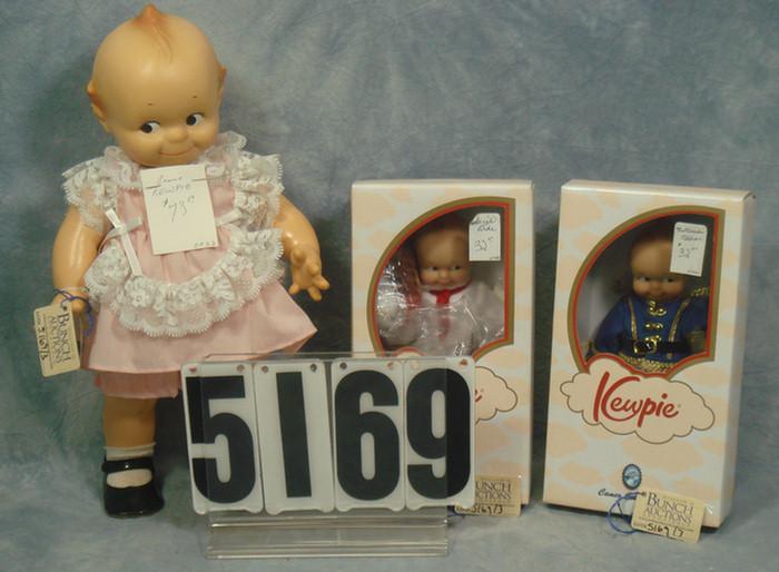 Kewpie dolls, 8 to 15 inches tall,