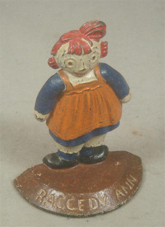 Cast iron bookend, Raggedy Ann figure