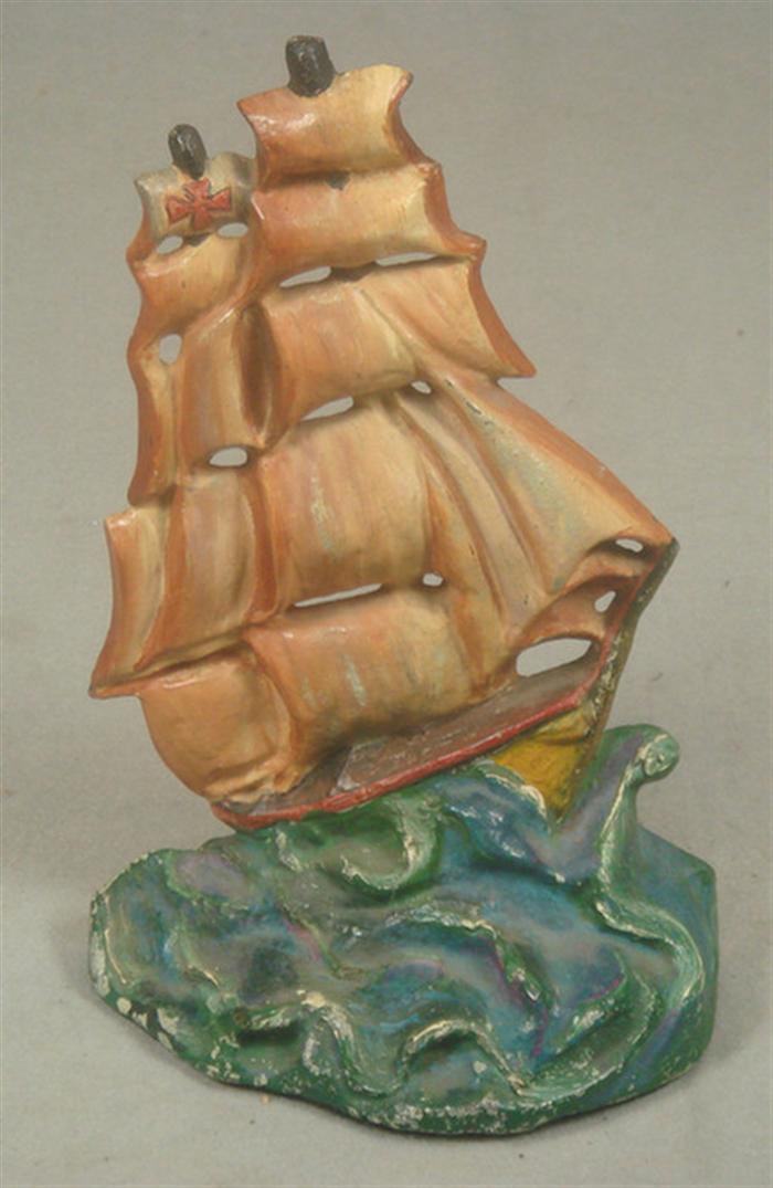 Cast iron doorstop, pirate ship with