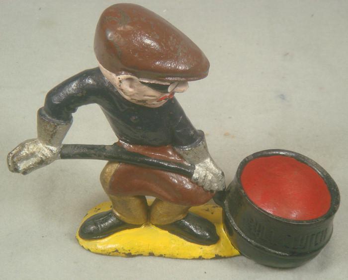 Cast iron doorstop, iron worker with