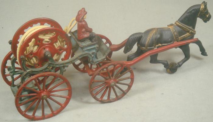 Cast iron toy horse drawn fireman s 3c642