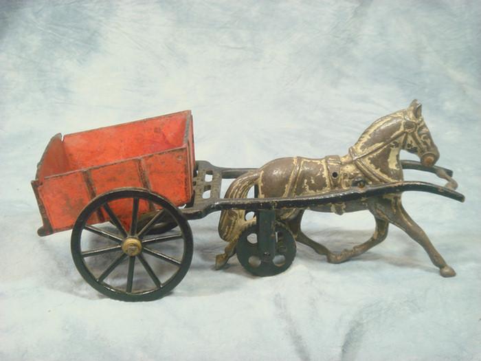 Cast iron toy, horse drawn red cart,