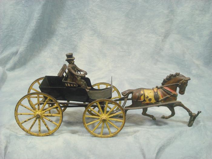 Cast iron toy, horse drawn open