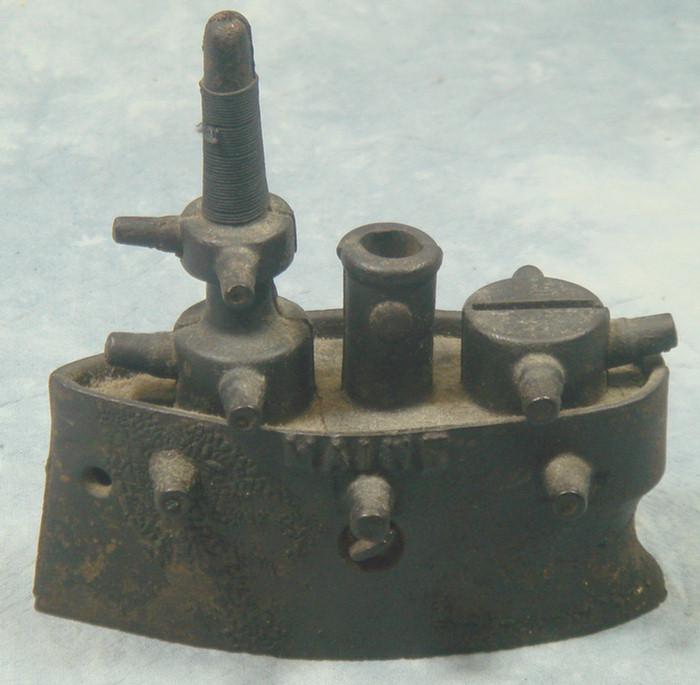 Battleship Maine cast iron still bank,