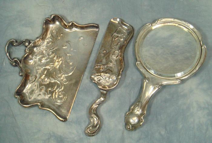 Sterling backed mirror with seated 3c660