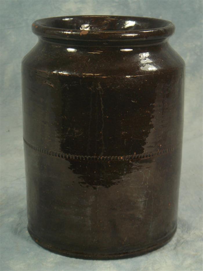 Brown glazed redware pottery jar, band