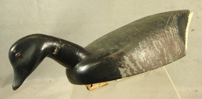 Carved duck decoy, incised tail feathers,