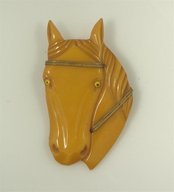 Bakelite horse head pin butterscotch 3cd2a