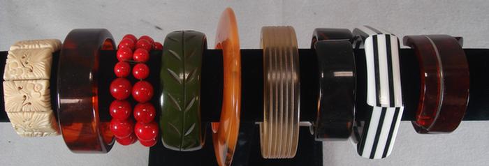 9 bakelite/plastic/bone bracelets  