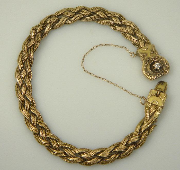 14K YG braided bracelet stamped 3cd57