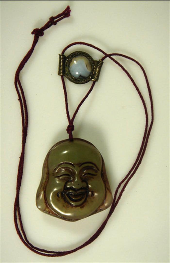 Carved jade hotai face pendant 3cda0