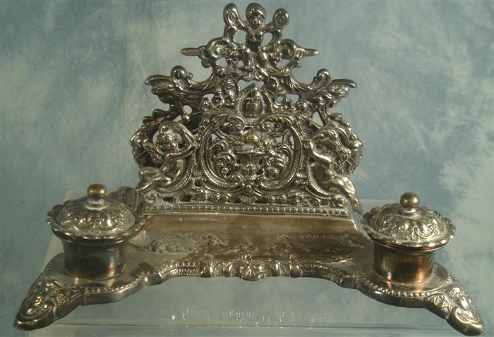 Plated silver desk stand, cherub & floral