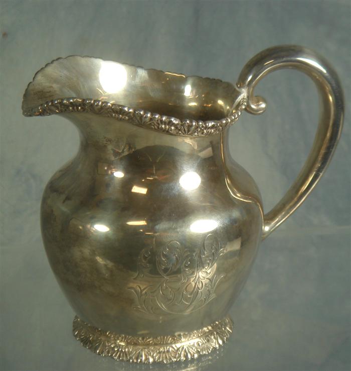 Sterling silver cream pitcher, retailed