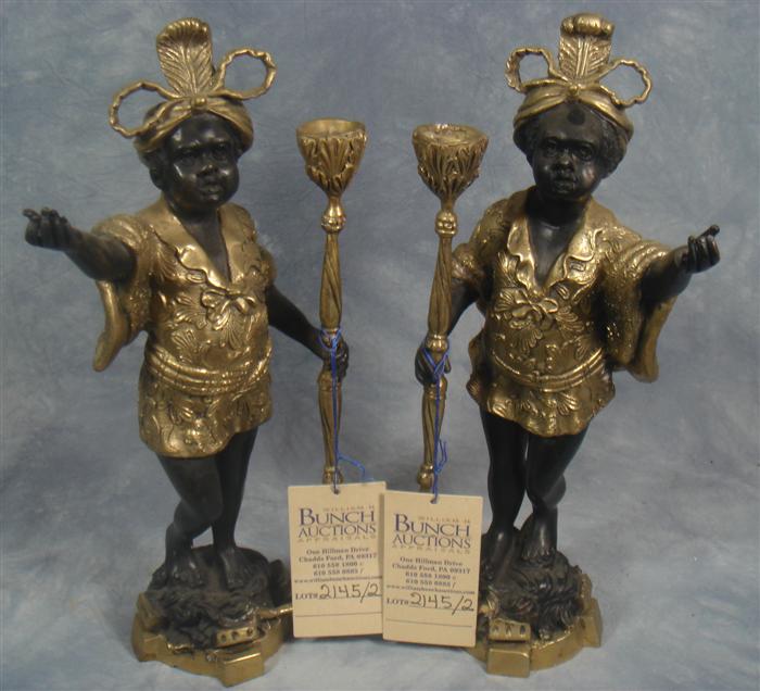 Pair of brass blackamoor candle holders,