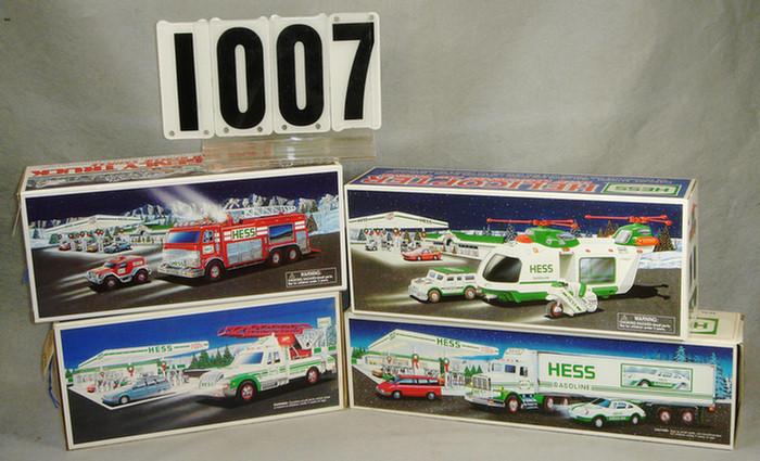 Lot of 4 Hess Trucks, all mint in original