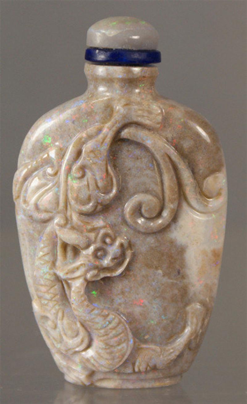 Carved opal snuff bottle, relief